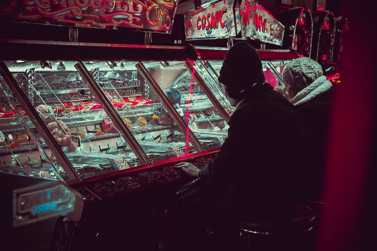 A man plays slot machines